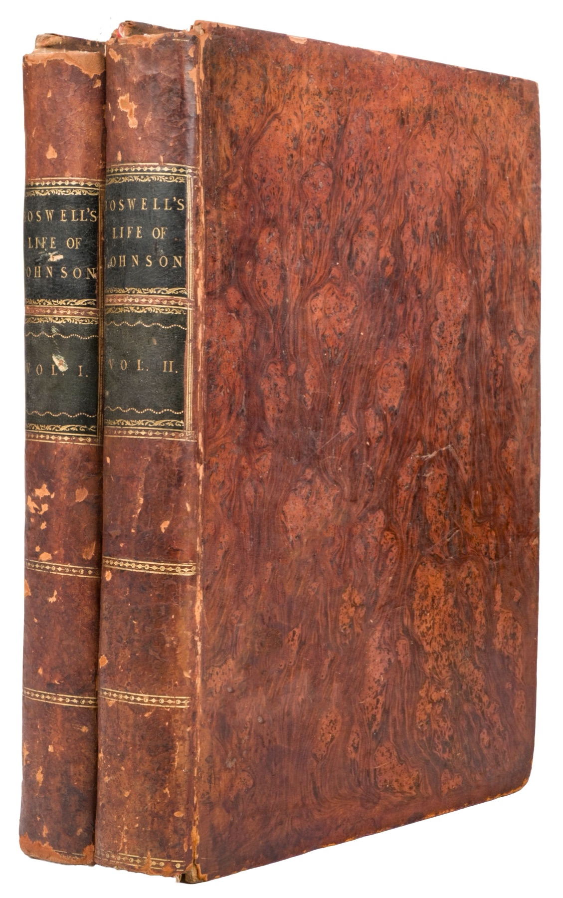 The bindings as bought — contemporary tree calf, the gilt worn and the calf flaking