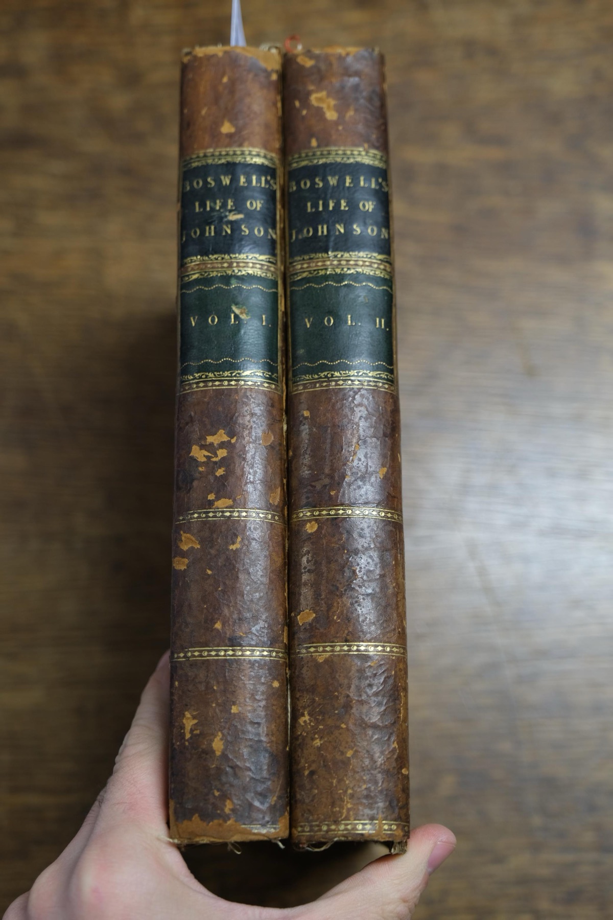 Both spines. The green morocco labels are the ones the restorer preserved